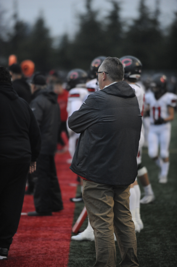 Former Camas Mmyor Scott Higgins enjoys the 4A state football championship game in Tacoma from the sidelines.
