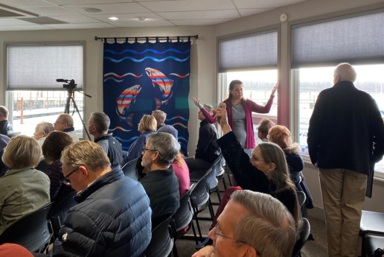 A standing-room-only crowd packs a legislative town hall held Jan.