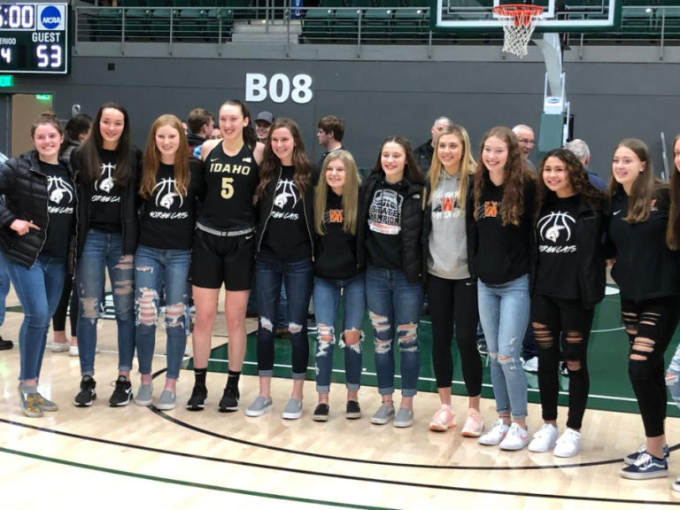 Beyonce Bea (center) recieves a warm homecoming from two of her best high school friends, Megan Churchman and Paige Hungerford.
