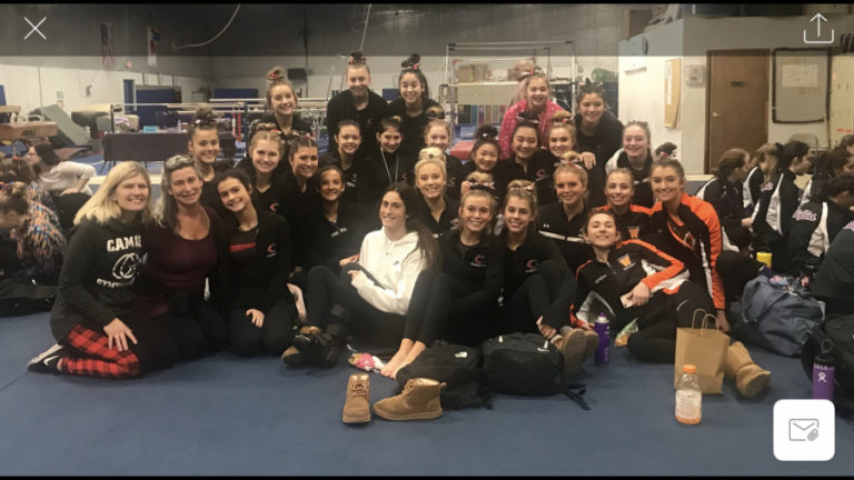 The Camas gymnastics team celebrates another win on Jan. 18.