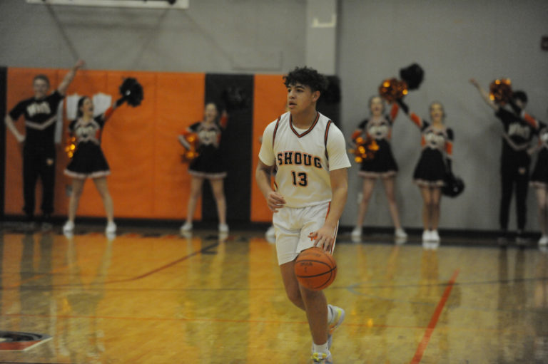 Yanni Fassilis, a 6-foot-3 freshman, displays his ball-handling skills during the Panthers&#039; Jan. 13 game against Hockinson.