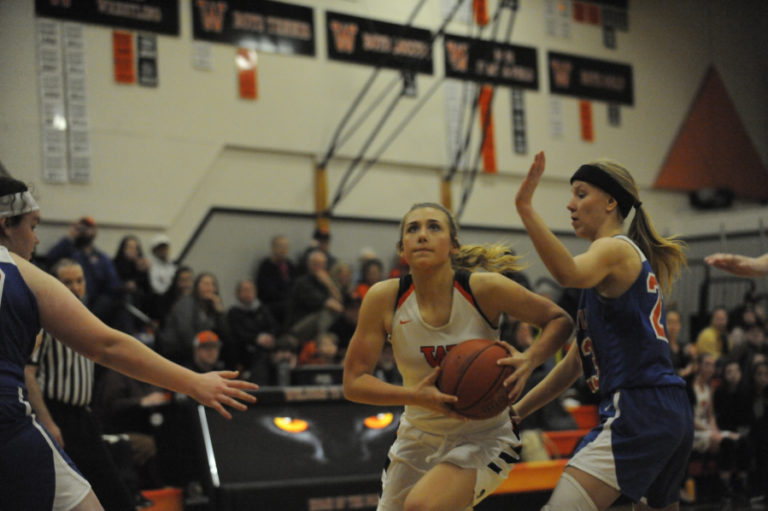 Washougal senior co-captain McKinley Stotts drives for two points against Port Angeles on Jan. 25.