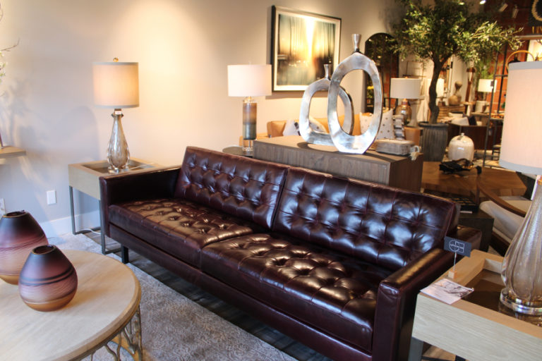 A "garnet" leather couch for sale at Juxtaposition is one of several crafted by the eco-friendly American Leather company.