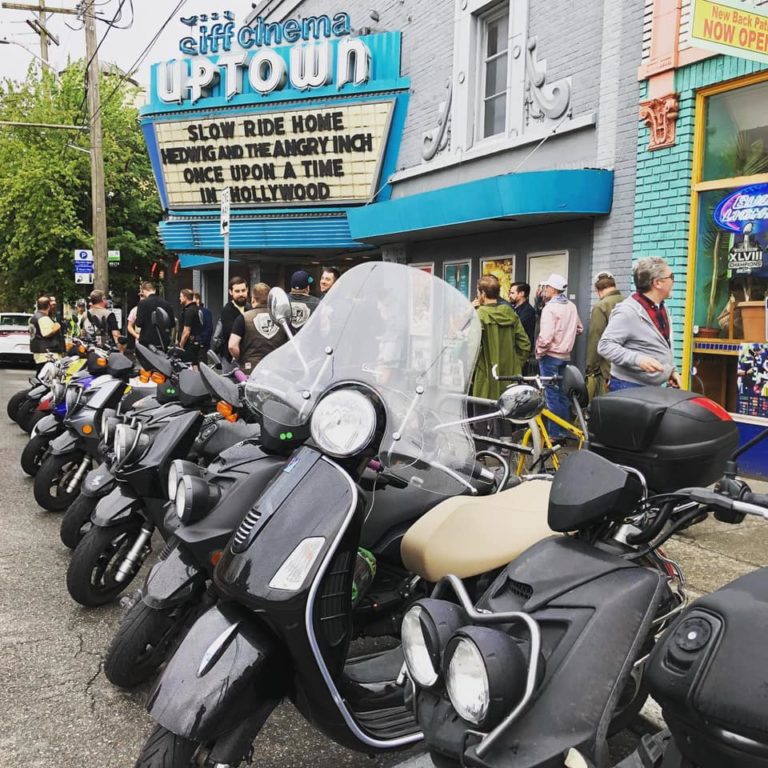 (Contributed photos courtesy of Joe Hammill) Scooters are parked outside the Siff Uptown Theater in Seattle for a July 2019 screening of "Slow Ride Home."