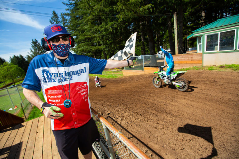 A motocross rider (right)  celebrates the end of a race during a "recreational ride day" event held May 8-9 at Washougal MX Park.