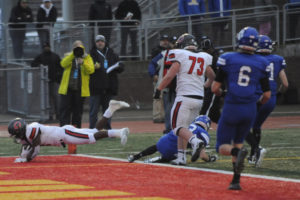 Camas High School running back Jacques Badolato-Birdsell (left) scores a touchdown during the 4A state championship game in December 2019. The 2020 prep football season has been moved back to the spring of 2021 due to the ongoing COVID-19 pandemic. (Post-Record file photo)