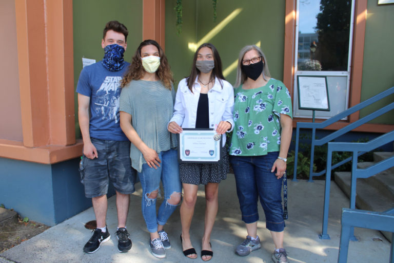Hillary Darland (second from right) stands outside Camas City Hall with her mother, Laura Darland (right); older sister, Meleah Darland (second from left); and her sister's boyfriend, Josiah Davis (left).