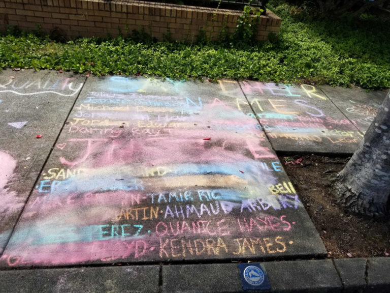 "Before and after" photos show the damage done to public artwork outside the Camas library in July, after someone smudged out all signs of Black Lives Matter.