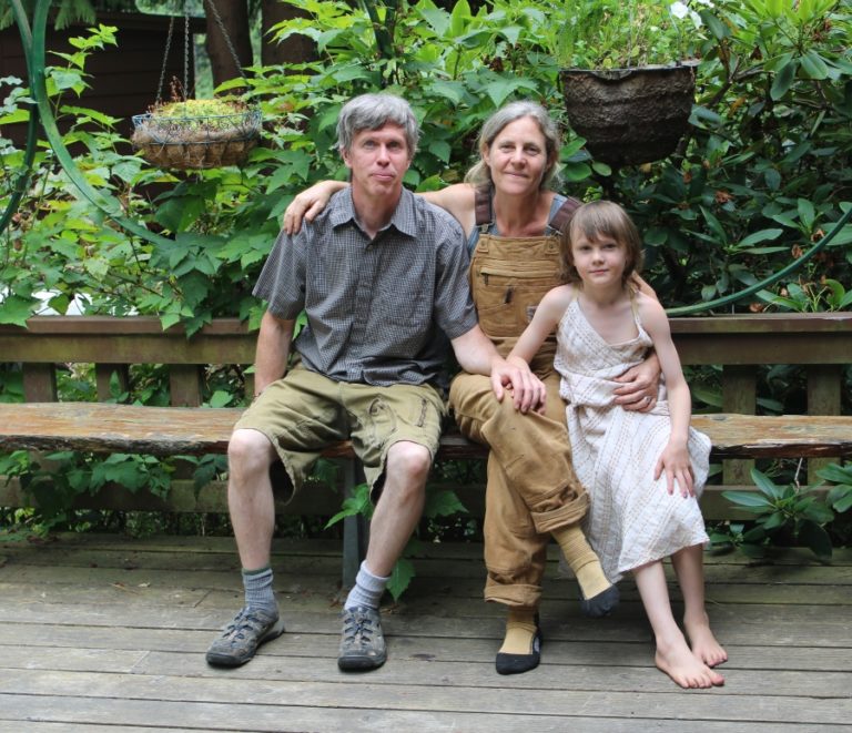 Derek and Lara Scanlon, with their 6-year-old son, Nate, gather outside their Washougal home on Aug. 20.