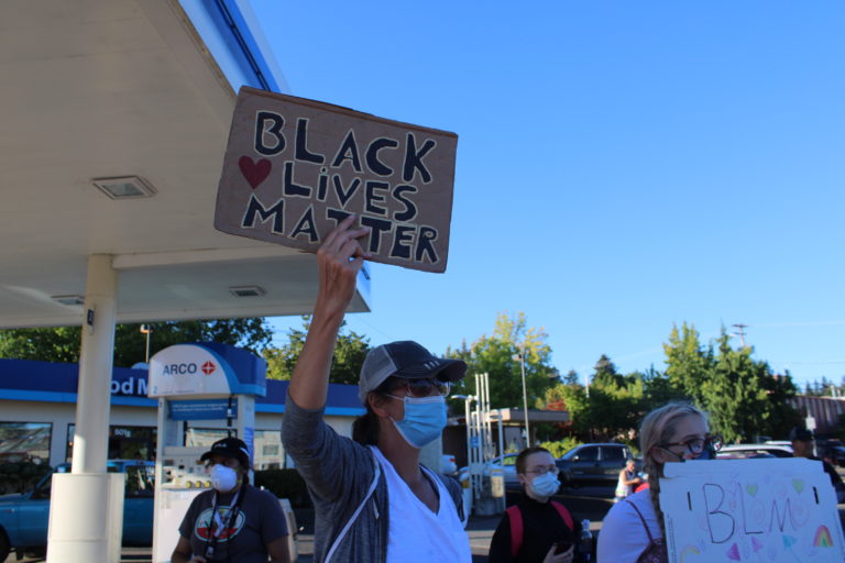 Opposing rallies -- one for Black Lives Matter, another for the pro-police "Blue Lives Matter" -- take place along Northeast Third Avenue in downtown Camas on Friday, Aug. 28. (Photos by Kelly Moyer/Post-Record)