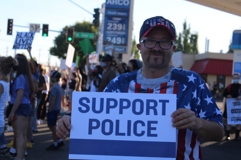 Opposing rallies -- one for Black Lives Matter, another for the pro-police "Blue Lives Matter" -- take place along Northeast Third Avenue in downtown Camas on Friday, Aug. 28. (Photos by Kelly Moyer/Post-Record)