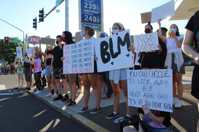 Opposing rallies -- one for Black Lives Matter, another for the pro-police "Blue Lives Matter" -- take place along Northeast Third Avenue in downtown Camas on Friday, Aug. 28. (Photos by Kelly Moyer/Post-Record)