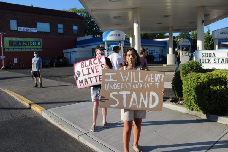 Opposing rallies -- one for Black Lives Matter, another for the pro-police "Blue Lives Matter" -- take place along Northeast Third Avenue in downtown Camas on Friday, Aug. 28. (Photos by Kelly Moyer/Post-Record)
