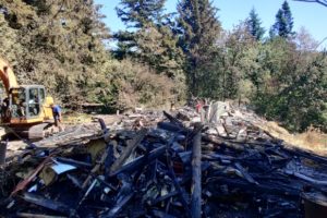Contributed photo courtesy John Bryden 
 The Washougal house owned by Jack and Lori Loranger burned to the ground on Aug. 14. They are in the beginning stages of building a new house on the property. (Contributed photo courtesy of John Bryden)