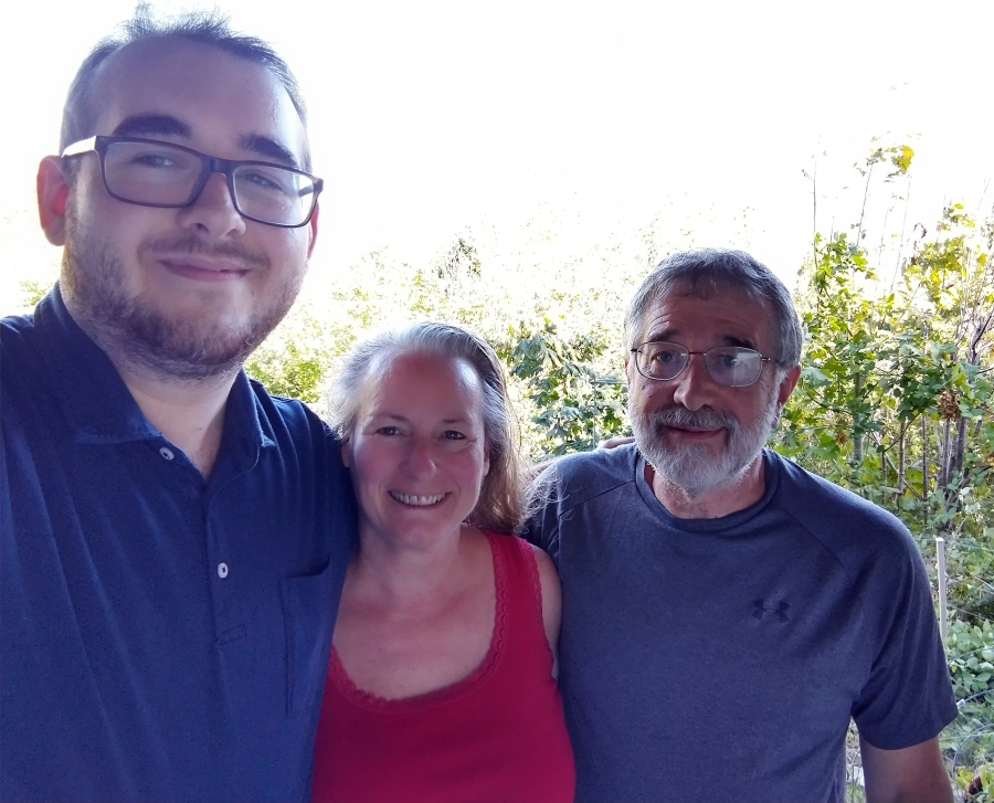 Contributed photo courtesy Jack Loranger 
 Jack Loranger (right) is working to rebuild his Washougal house, where he lived with son Jake (left) and wife Lori (center) before it burned to the ground on Aug. 14.
