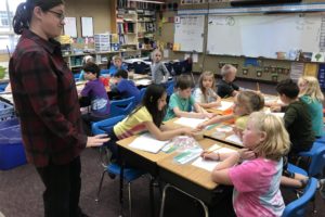 Mount Pleasant School second/third-grade teacher Cara Ramsey helps students Ole Stiles, McKinley Williams, Lilly Blaisdell and Audrey Morales with a science project Monday, Oct. 7, 2019. (Doug Flanagan/Post-Record files)  