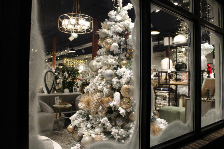 A holiday display illuminates the front windows at Juxtaposition in downtown Camas on Dec.