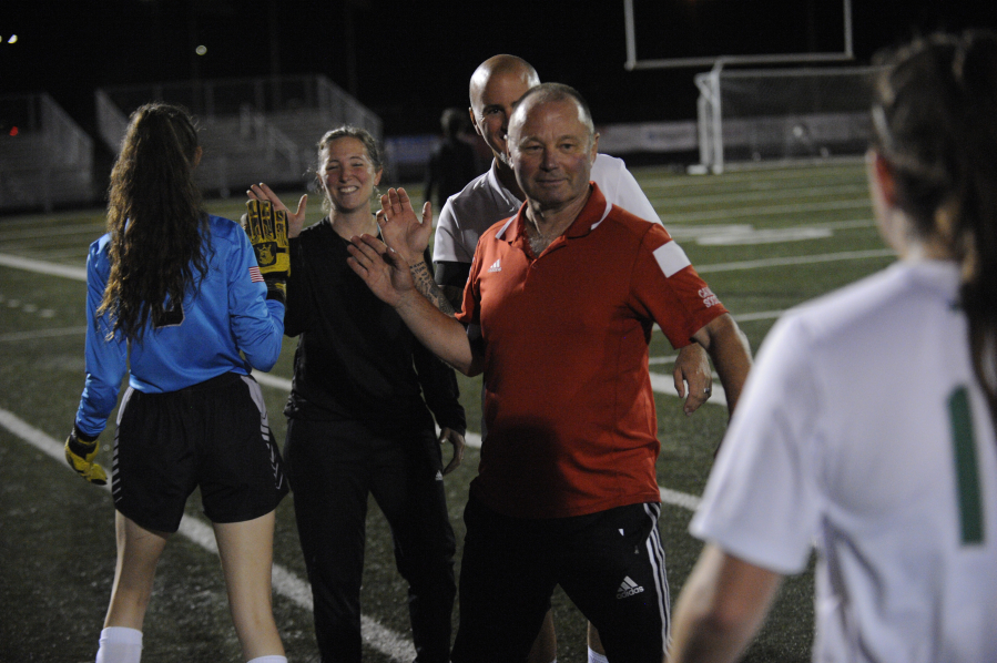 Camas High School girls soccer head coach Keri Tomasetti (black shirt) coaches a game on Sept. 12, 2019.