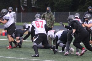 Camas football players run a play during a practice session at Camas High School on Monday, Feb. 22. The Papermakers will begin their 2020-21 season with a home game against the Union High School Titans on Friday, Feb. 26, at Doc Harris Stadium. (Doug Flanagan/Post-Record)