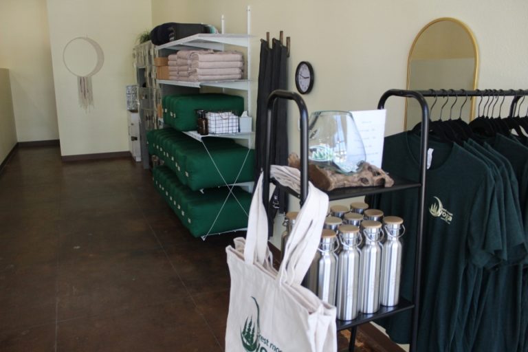 The new Forest Moon Yoga studio includes storage lockers, mat and towel rental, and merchandise for sale.
