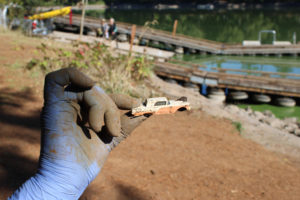 Lisa Tangen, of Vancouver, holds a vintage toy car she and her husband, Tom Tangen, discovered during the annual Lacamas Lake cleanup on Saturday, Sept. 25, 2021. (Photos by Kelly Moyer/Post-Record)