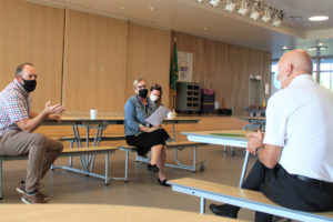 Camas School Board members Corey McEnry (left) and Connie Hennessey (second from left) listen as community members share the qualities they hope the next Camas schools superintendent will bring to the district during a community "listening post," held at Lacamas Lake Elementary School on Sept. 25, 2021. (Kelly Moyer/Post-Record)