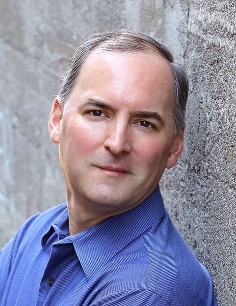 Lacamas Magazine owner Ernie Geigenmiller is running against incumbent Camas School Board member Corey McEnry in the Nov. 2 General and Special Election.