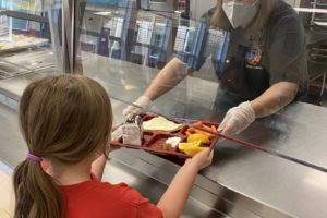 Hathaway Elementary School Principal Wendy Morrill serves lunch to students in October 2021. (Contributed photo courtesy of Washougal School District)