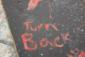 A warning tells participants in the 2018 Washougal High "Screen Screams" haunted house to "turn back" on Oct. 20, 2018.