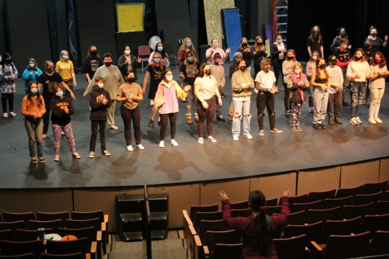 Washougal High School student Daria Eremenko leads a group of performers during a rehearsal session for the Washougal School District&#039;s upcoming musical production &quot;All Together Now!&quot; at Washougal High School on Nov.