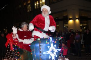 Santa and Mrs. Claus wave from an illuminated float during the 2019 Washougal Lighted Christmas Parade. (Doug Flanagan/Post-Record files)