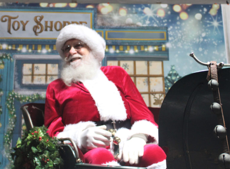 Santa Claus greets visitors to his "toy shoppe" during the city of Camas' 2021 Hometown Holidays event on Friday, Dec. 3, 2021. (Kelly Moyer/Post-Record)