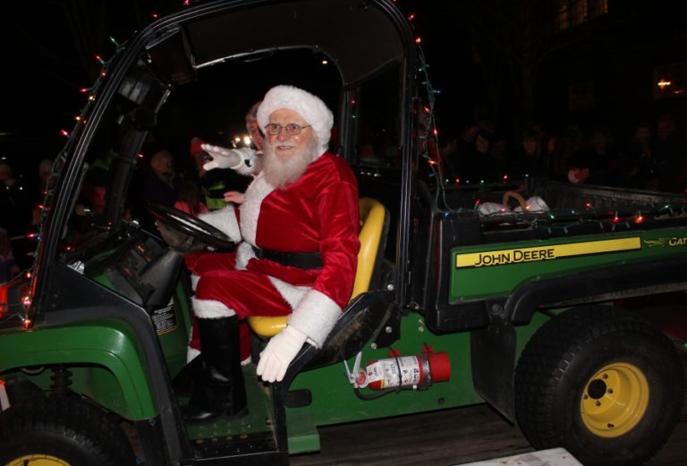 Santa Claus and Mrs. Claus wave to spectators during the Washougal Lighted Christmas Parade on Thursday, Dec 2, 2021. (Doug Flanagan/Post-Record)