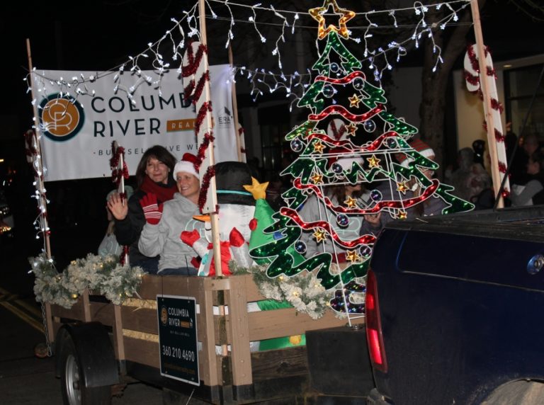 A lighted vehicle advertises Washougal’s Columbia River Realty during the Washougal Lighted Christmas Parade on Thursday, Dec 2, 2021. (Doug Flanagan/Post-Record)
