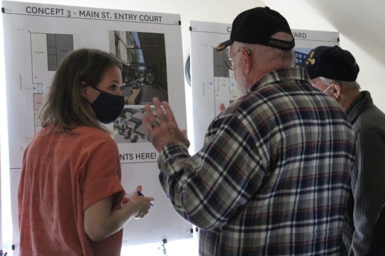 Doug Flanagan/Post-Record 
 Amalie Reynaud of Hacker Architects talks with attendees during a public meeting about the new Washougal library on Wednesday, March 16, at the Children&#039;s Home Society of Washington building in Washougal. (Contributed illustration courtesy of Hacker Architects)