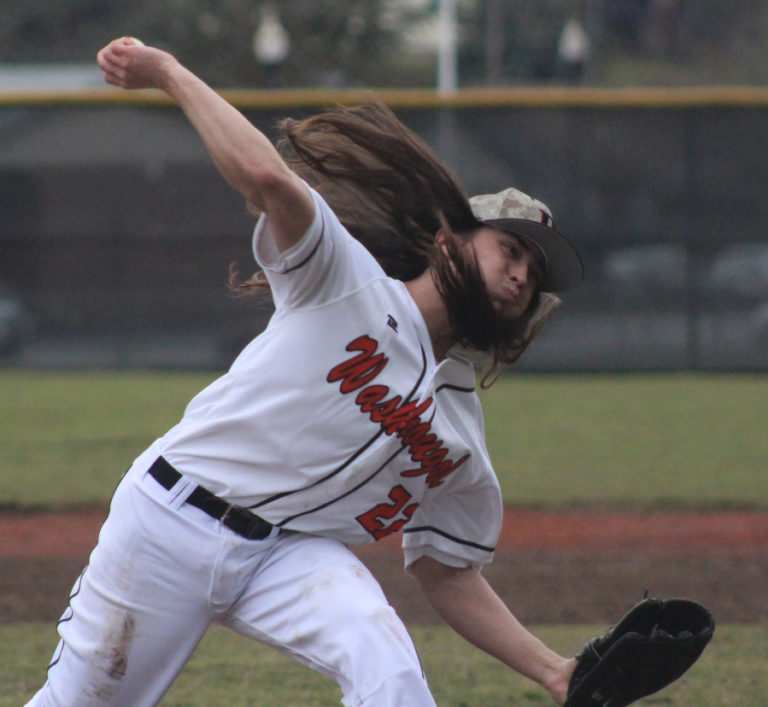 Washougal High School pitcher Kohner Robledo throws a pitch during the Panthers&#039; home softball game against Centralia High School on Thursday, March 17, 2022.