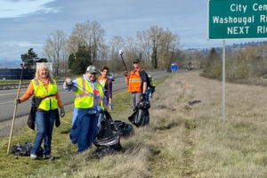 Contributed photo courtesy Melanie Wilson
Camas and Washougal residents (from left to right) Brenda Hatton, Lynne Lyne, Wendi Moose, and John Meier pose for a photograph while picking up trash alongside State Route 14 on Saturday, March 23. (Contributed photo courtesy of Melanie Wilson)