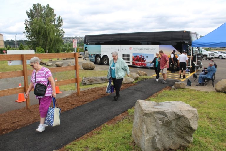 American Empress passengers return to the riverboat after visiting Camas and Washougal on Wednesday, June 8, 2022.
