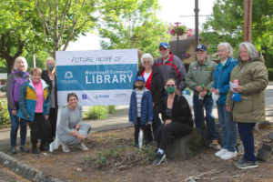 Contributed photo courtesy Rene Carroll
Friends of the Washougal Library fundraising group members pose for a photograph in front of a sign at hte future home of the new Washougal library in 2021.