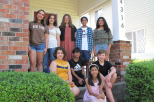 Nine of Washougal resident Diana Larson's voice private voice students recorded a song for Portland musician Michael Allen Harrison's upcoming musical adaption of "It's A Wonderful Life" at the musician's Beaverton, Ore., studio on Tuesday, Aug. 30. Top row, left to right: Amanda Osorio, Tia Williams, Catherine Yung, Shaunak Deshpande and Shalaka Deshpande. Second row, left to right: Eve Deva, Ricky Dodla and Ben Termini. Front row: Sadhana Parachuri. (Contributed photo courtesy Diana Larson)