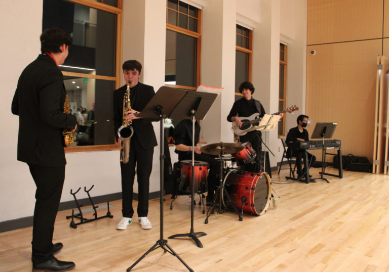 Camas High School musicians entertain a crowd gathered inside the Camas School District's newly renovated Joyce Garver Theater on Wednesday, Oct. 19, 2022. The school district included the historic theater's renovation in a $119 million bond Camas School District voters approved in February 2016. The new theater includes a two-story lobby, new restrooms, updated sound and lighting systems and many structural improvements.