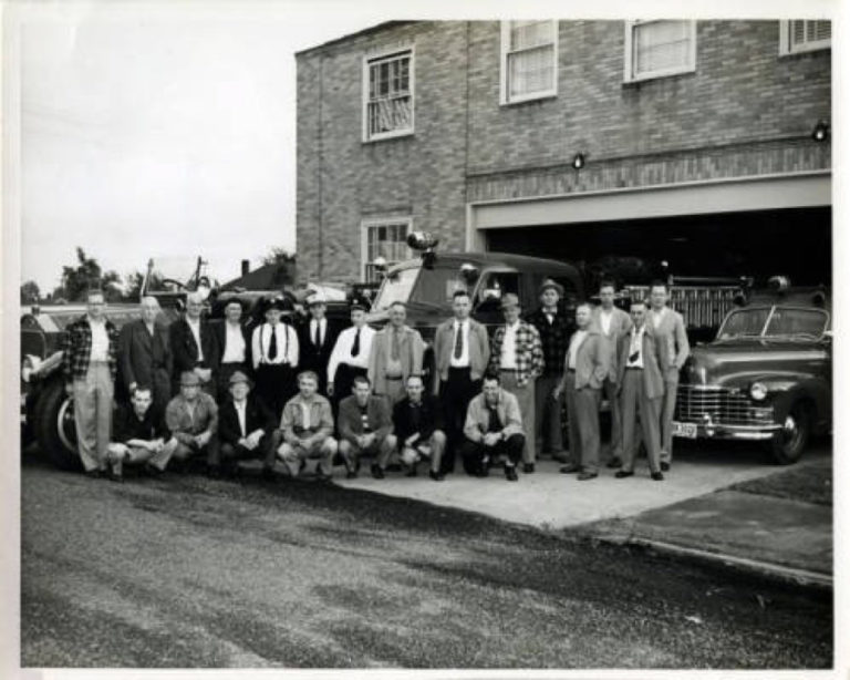 Camas Fire Department staff stand in front of their station in 1951. The fire station was part of Camas City Hall in 1951. This section of the Camas Public Library building now houses the children's library.