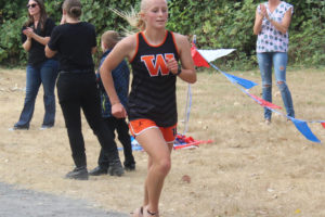 Washougal High School runner Elle Thomas competes in a cross country race at William Clark Park in September 2022. (Doug Flanagan/Post-Record)
