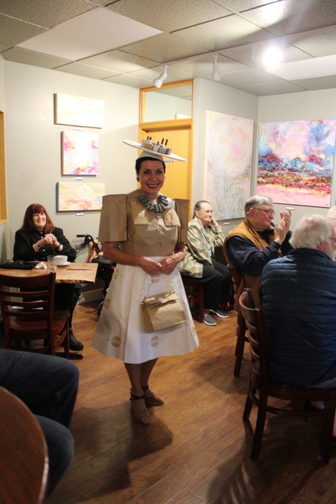 Downtown Camas Association Board member and past DCA Board president Caroline Mercury wears a paper dress to celebrate Camas' history as a paper mill town, during the DCA's 