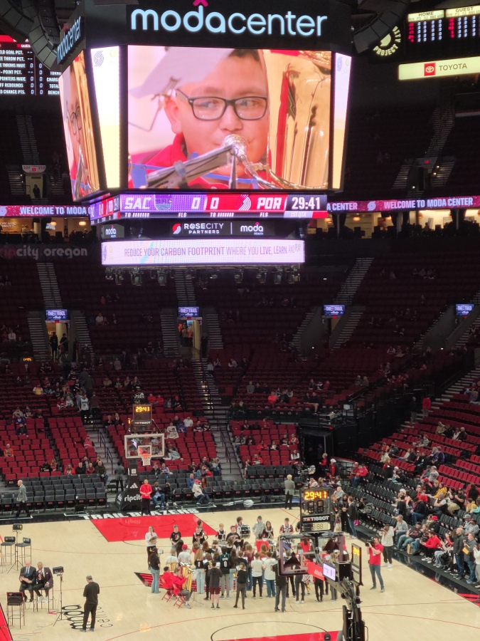 Members of the Jemtegaard Middle School wind ensemble perform a song at the Moda Center in Portland before the start of the Portland Trail Blazers' game against the Sacramento Kings on Wednesday, March 29, 2023.