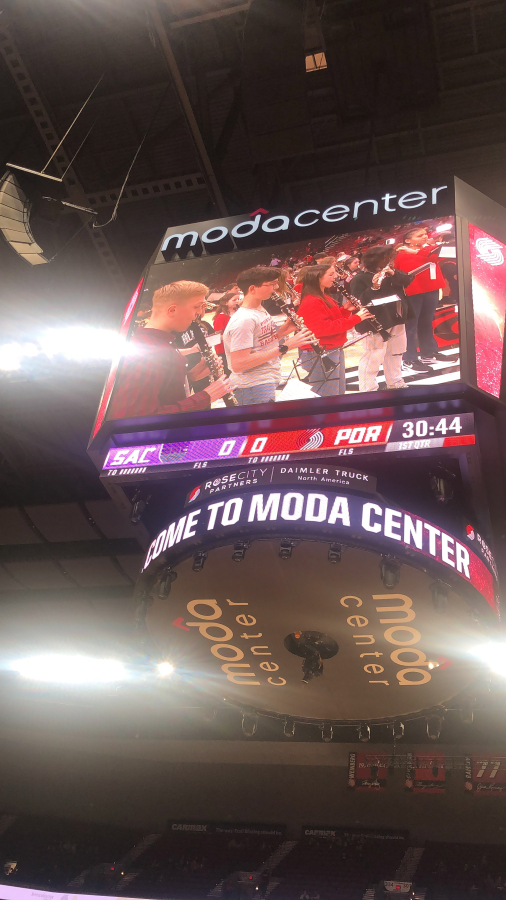 Members of the Jemtegaard Middle School wind ensemble perform a song at the Moda Center in Portland before the start of the Portland Trail Blazers' game against the Sacramento Kings on Wednesday, March 29, 2023.