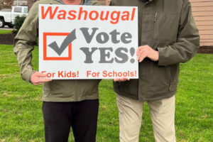 Roger Daniels (right) holds a 