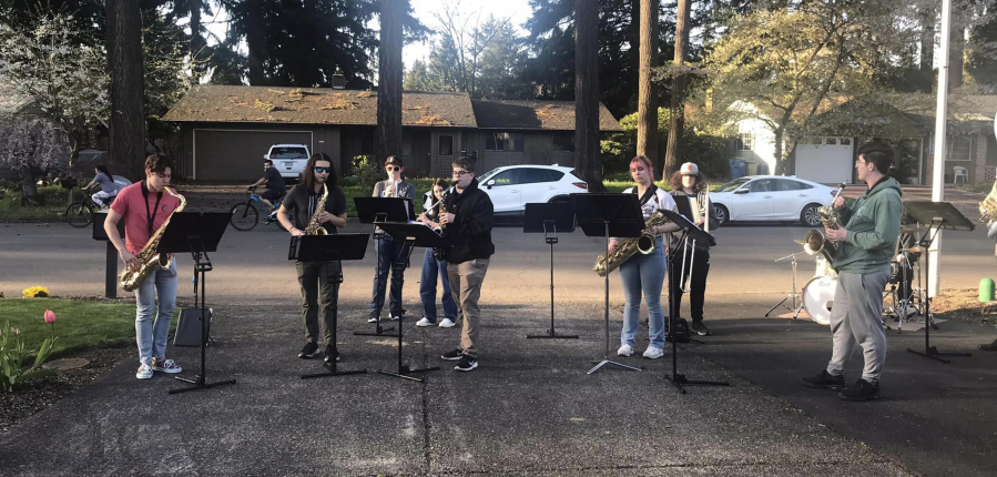The Washougal High School jazz ensemble performs April 25, 2023, in the driveway of Ray Johnson's Vancouver residence. (photos courtesy of Blake Perkins)