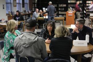 Doug Flanagan/Post-Record
Washougal School District Director of Teaching and Learning Tracey MacLachlan (center) talks to attendees at the school district's 