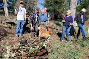 A group of Washougal residents gather for a cleanup event at Mable Kerr Park in Washougal, Sunday, March 17, 2024.